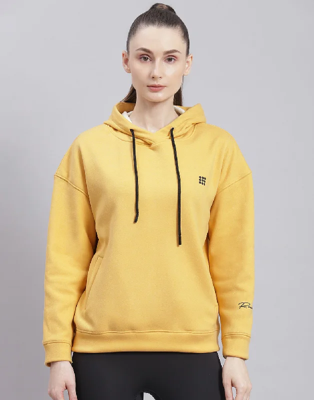 Women Yellow Solid Hooded Full Sleeve Sweatshirt Hoodie with Hem Ribbing Snug Secure